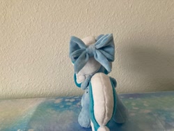 Size: 1280x960 | Tagged: safe, artist:melodisde, imported from derpibooru, oc, oc:snowdrop, pegasus, pony, blind, bow, commission, female, filly, foal, folded wings, happy, irl, photo, plushie, smiling, solo, standing, wings