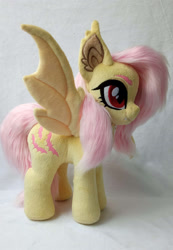 Size: 1920x2776 | Tagged: safe, artist:doctorkoda, imported from derpibooru, fluttershy, bat pony, pony, bat ponified, bat wings, ear fluff, female, flutterbat, irl, mare, photo, plushie, race swap, solo, spread wings, standing, wings