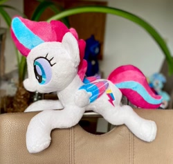 Size: 2048x1942 | Tagged: safe, artist:rtryart, imported from derpibooru, zipp storm, pegasus, pony, colored wings, colored wingtips, female, folded wings, g5, irl, lying down, mare, photo, plushie, prone, solo, wings
