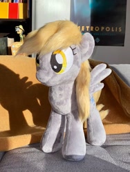 Size: 1536x2048 | Tagged: safe, artist:rtryart, imported from derpibooru, derpy hooves, pegasus, pony, female, irl, mare, photo, plushie, smiling, solo, spread wings, standing, wings