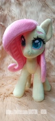 Size: 1890x4096 | Tagged: safe, artist:doctorkoda, imported from derpibooru, fluttershy, pegasus, pony, female, folded wings, irl, mare, photo, plushie, smiling, solo, standing, wings