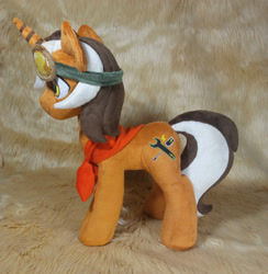 Size: 3120x3196 | Tagged: safe, artist:doctorkoda, imported from derpibooru, oc, oc only, pony, unicorn, clothes, commission, goggles, horn, irl, male, photo, plushie, scarf, smiling, solo, stallion, standing