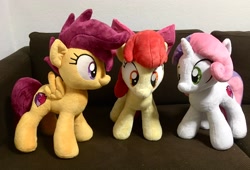 Size: 2048x1390 | Tagged: safe, artist:rtryart, imported from derpibooru, apple bloom, scootaloo, sweetie belle, earth pony, pegasus, pony, unicorn, apple bloom's bow, bow, cutie mark crusaders, female, hair bow, horn, irl, photo, plushie, smiling, spread wings, standing, trio, trio female, wings