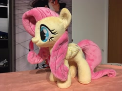 Size: 2048x1536 | Tagged: safe, artist:rtryart, imported from derpibooru, fluttershy, pegasus, pony, female, folded wings, irl, mare, photo, plushie, smiling, solo, standing, wings