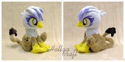 Size: 4096x2043 | Tagged: safe, artist:hellgacraft, imported from derpibooru, gilda, griffon, beak, female, irl, leonine tail, paws, photo, plushie, sitting, solo, tail, talons, younger