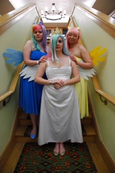 Size: 3744x5616 | Tagged: safe, artist:jimthecactus, imported from derpibooru, fluttershy, princess celestia, rainbow dash, human, absurd resolution, clothes, cosplay, costume, dress, female, hands together, irl, looking at you, photo, pony ears, stairs, trio