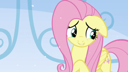 Size: 1280x720 | Tagged: safe, imported from derpibooru, screencap, fluttershy, pegasus, the crystalling, cute, female, floppy ears, mare, shyabetes, snow, solo