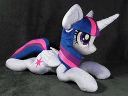 Size: 1592x1206 | Tagged: safe, artist:doctorkoda, imported from derpibooru, twilight sparkle, alicorn, pony, female, folded wings, happy, horn, irl, lying down, mare, photo, plushie, prone, smiling, solo, twilight sparkle (alicorn), wings