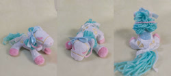 Size: 1280x573 | Tagged: safe, artist:starfulstitches, imported from derpibooru, oc, earth pony, pony, female, lying down, mare, photo, plushie, prone, sitting, solo