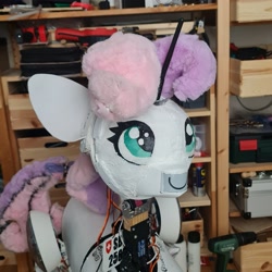 Size: 2992x2992 | Tagged: safe, artist:sweetie bot 2560, derpibooru exclusive, imported from derpibooru, sweetie belle, oc, oc only, oc:sweetie bot 2560, pony, robot, robot pony, unicorn, 3d print, assembly, disassembly, e-ink, e-paper, electronics, gazing, gears, irl, license plate, maintenance, partial disassembly, photo, robot gore, servo, smiling, solo, sweetie bot, switzerland, upgrade, wires