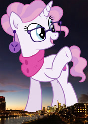 Size: 1673x2356 | Tagged: safe, artist:cirillaq, edit, editor:jaredking779, imported from derpibooru, raspberry latte, pony, unicorn, ear piercing, earring, female, frankfurt, germany, giant pony, giantess, glasses, high res, highrise ponies, irl, jewelry, macro, mare, open mouth, photo, piercing, ponies in real life, raised hoof, smiling, solo