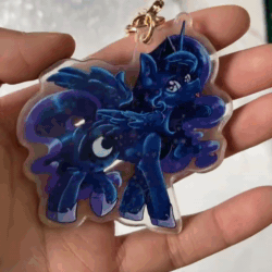 Size: 1440x1440 | Tagged: safe, artist:dankpegasista, derpibooru exclusive, edit, imported from derpibooru, applejack, pinkie pie, princess luna, trixie, twilight sparkle, alicorn, earth pony, human, pony, unicorn, :p, accessory, acrylic plastic, animated, applejack's hat, balloon, bangs, big eyes, blue hair, butt, cape, charm, chest fluff, clothes, colored lineart, cowboy hat, cute, diatrixes, ear fluff, effects, ethereal mane, ethereal tail, eyebrows, eyelashes, feathered wings, female, flowy mane, flying, hair tie, hand, hat, heart, heart eyes, highlights, irl, irl human, jewelry, keychain, large wings, looking at you, lunabetes, mare, merchandise, moonbutt, open mouth, photo, pink mane, presenting, purple eyes, purple fur, raised hoof, regalia, royalty, sample, shading, smiling, smiling at you, sneak peek, sparkles, spread wings, tail, three quarter view, tongue out, trixie's cape, trixie's hat, twiabetes, twilight sparkle (alicorn), upright, video, wall of tags, webm, wingding eyes, wings