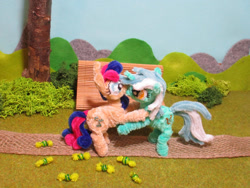 Size: 1280x961 | Tagged: safe, artist:malte279, imported from derpibooru, part of a set, bon bon, lyra heartstrings, sweetie drops, earth pony, pony, unicorn, bench, candy, chenille, chenille stems, chenille wire, craft, female, food, irl, kissing, lesbian, part of a series, photo, pipe cleaner sculpture, pipe cleaners, ship:lyrabon, shipping