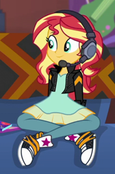 Size: 286x431 | Tagged: safe, imported from derpibooru, screencap, sunset shimmer, human, equestria girls, equestria girls series, game stream, spoiler:eqg series (season 2), clothes, couch, cropped, cute, dress, gamer sunset, headphones, jacket, leather, leather jacket, pants, shimmerbetes, solo, sunset's apartment, trainers