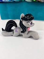 Size: 780x1040 | Tagged: safe, artist:kazzysart, imported from derpibooru, octavia melody, earth pony, pony, irl, lying down, photo, plushie, prone, solo, sploot