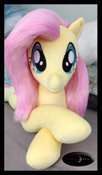 Size: 1280x2186 | Tagged: safe, artist:purplenebulastudios, imported from derpibooru, fluttershy, pegasus, pony, irl, looking at you, lying down, photo, plushie, prone, solo, sploot