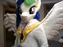 Size: 1600x1200 | Tagged: safe, artist:atalonthedeer, artist:giovannimagnus, imported from derpibooru, alicorn, 2018, bust, confuzzled, fursuit, indoors, jewelry, ponysuit, portrait, regalia, spread wings, wings