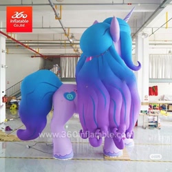 Size: 800x800 | Tagged: safe, imported from derpibooru, izzy moonbow, inflatable pony, pony, unicorn, 360 inflatable, female, g5, horn, indoors, inflatable, inflatable unicorn, irl, izzy is tol, logo, mare, matte, photo, shiny floor, side view, solo, standing, watermark