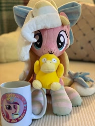 Size: 1536x2048 | Tagged: safe, artist:emberslament, artist:meplushyou, imported from derpibooru, princess cadance, oc, oc:bay breeze, pony, psyduck, bow, clothes, coffee mug, female, hair bow, irl, mare, mug, photo, plushie, pokémon, socks, solo, striped socks