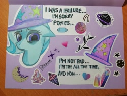 Size: 4160x3120 | Tagged: safe, artist:mashee, imported from derpibooru, trixie, pony, unicorn, card, horn, looking at you, looking down, photo, purple background, sad, simple background, stars, sticker, traditional art, trixie day