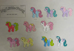 Size: 1600x1115 | Tagged: safe, imported from derpibooru, baby cuddles, baby gusty, baby half note, baby heart throb, baby lofty, baby ribbon, baby shady, baby sundance, earth pony, pegasus, pony, unicorn, baby lickety-split, baby tiddley-winks, bow, female, filly, foal, g1, horn, my little pony logo, official, reference sheet, spread wings, tail, tail bow, traditional art, wings