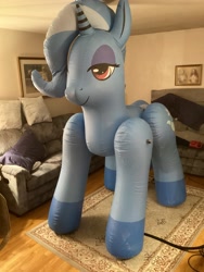 Size: 2448x3264 | Tagged: safe, artist:tbolt, imported from derpibooru, trixie, inflatable pony, pony, bootleg, carpet, colored hooves, couch, eyeshadow, female, framed picture, hongyi, hooves, indoors, inflatable, inflatable unicorn, inflation valve, irl, lidded eyes, makeup, mare, opaque inflatable, photo, seams, solo, standing