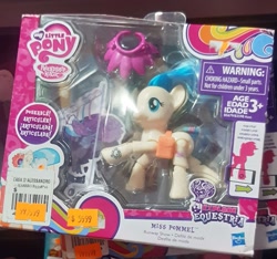 Size: 1803x1690 | Tagged: safe, imported from derpibooru, coco pommel, earth pony, pony, ages 3+, bag, barcode, choking hazard, explore equestria, female, irl, mare, photo, saddle bag, toy