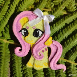 Size: 960x960 | Tagged: safe, artist:sofia metropolskaya, imported from derpibooru, fluttershy, pegasus, chibi, craft, cute, felt, felting, handmade, looking away, photo, ribbon, shyabetes, smiling, standing