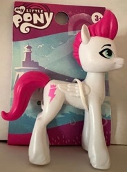 Size: 2559x3478 | Tagged: safe, imported from derpibooru, zipp storm, concave belly, g5, irl, merchandise, my little pony logo, photo, picture, slender, solo, thin, toy, unshorn fetlocks, zipp is skinny, zipp is tall