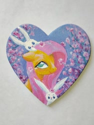 Size: 960x1280 | Tagged: safe, artist:moormoorfrog, imported from derpibooru, fluttershy, pegasus, pony, rabbit, animal, female, flower, heart, magnet, mare, smiling, traditional art