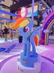 Size: 3024x4032 | Tagged: safe, imported from derpibooru, rainbow dash, pegasus, pony, chinese, indoors, irl, official, photo, side view, smiling, spread wings, standing, statue, text, wings