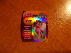 Size: 1024x768 | Tagged: safe, imported from derpibooru, pipp petals, pegasus, g5, indonesian, info, irl, looking at you, merchandise, my little pony: a new generation, official, photo, profile, shiny, smiling, smiling at you, standing, stars, sticker