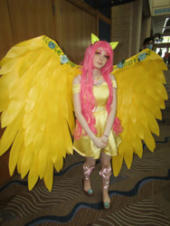 Size: 828x1104 | Tagged: safe, artist:sharidakenplz, imported from derpibooru, fluttershy, human, clothes, cosplay, costume, irl, irl human, large wings, metrocon, photo, wings