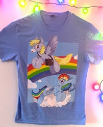 Size: 737x912 | Tagged: safe, artist:spookyfoxinc, imported from derpibooru, derpy hooves, rainbow dash, pegasus, background, clothes, cloud, design, etsy, fan made, flying, mail, mailmare, merchandise, rainbow, shirt, t-shirt