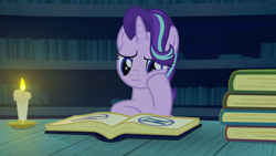 Size: 600x338 | Tagged: safe, artist:.derpy., imported from derpibooru, starlight glimmer, pony, unicorn, animated, book, bored, candle, horn, library, magic, magic aura, reading, sitting, studying