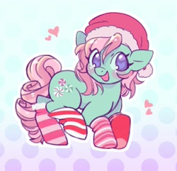 Size: 1627x1566 | Tagged: safe, artist:horseyuris, imported from derpibooru, minty, earth pony, pony, blushing, cheeks, christmas, clothes, curly mane, curly tail, cutie mark, g3, gradient background, green coat, happy, hat, heart, holiday, looking at you, pink mane, polka dot background, purple eyes, santa hat, smiling, smiling at you, socks, solo, striped socks, tail