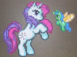 Size: 600x448 | Tagged: safe, artist:sparksparkles, imported from derpibooru, moondancer (g1), breezie, pony, unicorn, craft, g1, g3, horn, my little pony: pinkie pie's party, perler beads, rearing, unnamed breezie, unnamed character