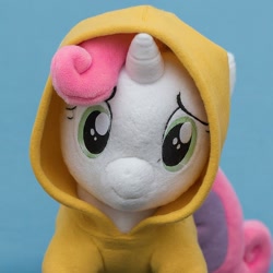 Size: 1536x1536 | Tagged: safe, imported from derpibooru, sweetie belle, pony, unicorn, ai content, ai generated, clothes, hoodie, horn, plushie, prompter:enterusxrname, solo