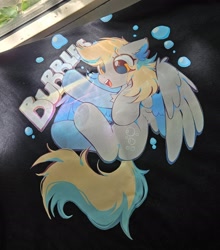 Size: 2653x3019 | Tagged: safe, artist:mirtash, imported from derpibooru, derpy hooves, pegasus, pony, blonde mane, blonde tail, bubble, chest fluff, countershading, cute, derp, derpabetes, design, ear fluff, eyelashes, female, gray coat, high res, in air, irl, long mane, long tail, mare, open mouth, open smile, partially open wings, photo, raised hoof, shiny eyes, shirt design, smiling, solo, tail, teeth, text, wing fluff, wingding eyes, wings, yellow eyes