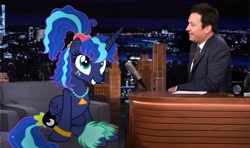 Size: 2048x1213 | Tagged: safe, alternate version, edit, imported from derpibooru, princess luna, alicorn, human, pony, 80s princess luna, city, duo, duo male and female, female, folded wings, grin, irl, irl human, jimmy fallon, male, mare, night, photo, ponytail, scrunchie, sitting, smiling, talk show, wings