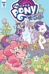 Size: 2063x3131 | Tagged: safe, artist:meaghan carter, idw, imported from derpibooru, pinkie pie, rarity, twilight sparkle, alicorn, earth pony, pony, unicorn, comic cover, cover, cover art, eyes closed, female, floral head wreath, floral necklace, flower, folded wings, horn, legends of magic #12, looking at mirror, mare, mirror, mouth hold, my little pony logo, my little pony: legends of magic, official comic, smiling, trio, trio female, twilight sparkle (alicorn), variant cover, wings