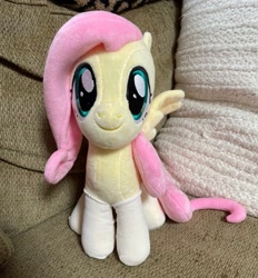 Size: 1169x1258 | Tagged: safe, imported from derpibooru, fluttershy, pegasus, clothes, female, green eyes, mare, merchandise, pink mane, plushie, socks, yellow coat