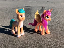 Size: 4000x3000 | Tagged: safe, artist:dingopatagonico, imported from derpibooru, hitch trailblazer, sunny starscout, alicorn, earth pony, duo, duo male and female, female, g5, male, photo, toy