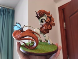 Size: 4624x3472 | Tagged: safe, artist:griffonleek, artist:tinybenz, imported from derpibooru, autumn blaze, butterfly, kirin, blushing, butterfly on tail, craft, cute, female, figurine, hoof fluff, insect on tail, irl, leonine tail, multiple angles, open mouth, photo, picture, raised hoof, raised leg, smiling, solo, tail, yellow eyes