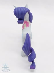 Size: 1620x2160 | Tagged: safe, alternate angle, alternate version, artist:lakterra, imported from derpibooru, rarity, pony, unicorn, both cutie marks, butt, clothes, craft, female, figurine, high angle, horn, irl, mare, photo, plot, polymer clay, scarf, signature, solo, striped scarf, tail, unshorn fetlocks