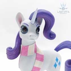 Size: 2560x2560 | Tagged: safe, alternate angle, alternate version, artist:lakterra, imported from derpibooru, rarity, pony, unicorn, close-up, clothes, craft, female, figurine, horn, irl, looking at you, mare, photo, polymer clay, scarf, signature, simple background, solo, striped scarf, tail, white background