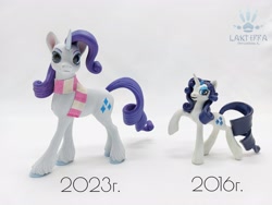 Size: 2560x1920 | Tagged: safe, artist:lakterra, imported from derpibooru, rarity, pony, unicorn, alternate hairstyle, clothes, comparison, craft, female, figurine, horn, irl, mare, photo, polymer clay, raised hoof, scarf, signature, solo, striped scarf, tail, unshorn fetlocks