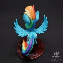 Size: 2560x2560 | Tagged: safe, alternate angle, alternate version, artist:lakterra, imported from derpibooru, rainbow dash, pegasus, pony, both cutie marks, butt, craft, female, figurine, high angle, irl, mare, photo, plot, polymer clay, rear view, signature, solo, spread wings, stand, tail, wings