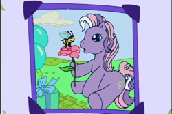Size: 720x480 | Tagged: safe, imported from derpibooru, screencap, wysteria, bee, earth pony, insect, pony, a charming birthday, balloon, birthday book, cloud, female, flower, g3, hoof hold, looking at something, mare, open mouth, outdoors, ponyville surprise birthday book, present, scrapbook, sitting, solo
