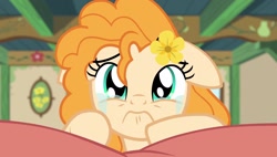 Size: 1920x1088 | Tagged: safe, imported from derpibooru, screencap, pear butter, season 7, the perfect pear, bedroom, crying, female, frown, hooves, pillow, solo, solo female, sparkly eyes, tears of pain, wingding eyes